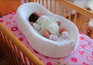Оригинальный аксессуар для максимально комфортного развития — кокон беби для новорожденных: преимущества и недостатки, виды и особенности приспособления